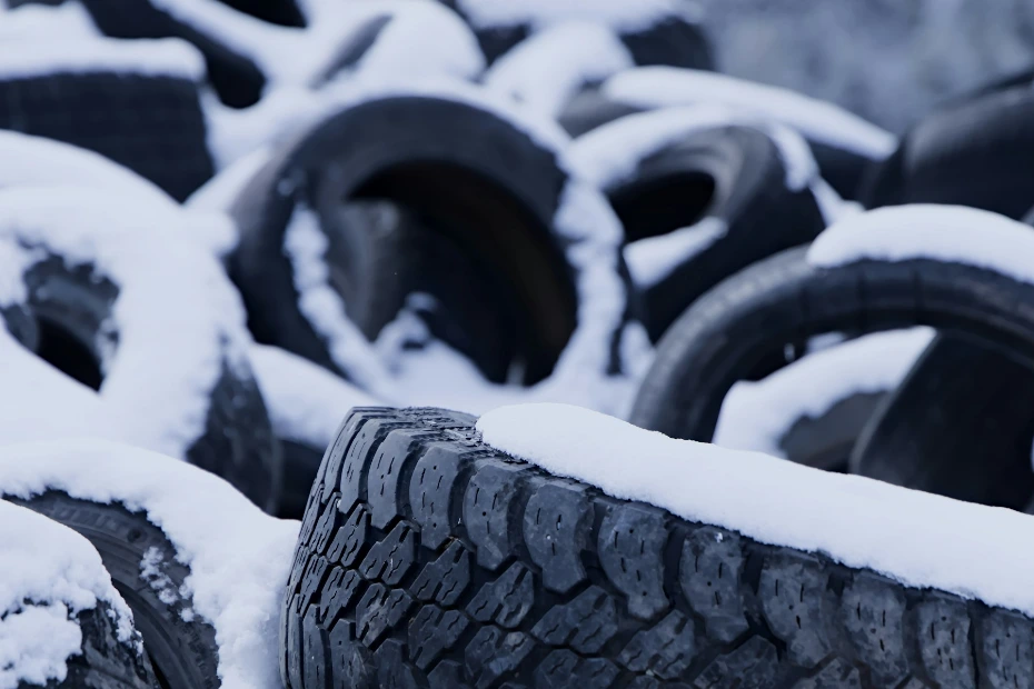 Tires covered in snow.